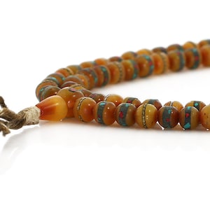 Tibetan Buddhist Mala Beads - Gemstone Inlaid Tibetan Mila Amber-hued Resin