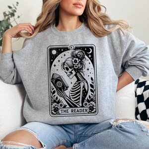 The Reader Tarot Card Shirt, Skeleton Reading Sweatshirt, Book Lover Hoodie, Tarot Lover Gift, Halloween Skeleton Tee, Bookish Gift T-shirt