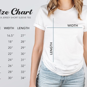 May include: Size chart for a unisex jersey short sleeve tee. The chart shows the width and length measurements in inches for sizes XS to 4XL.