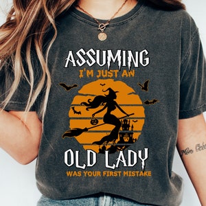 Witch Shirt, Assuming I'm Just An Old Lady Was Your First Mistake T-Shirt, Halloween T Shirt, Witch Broom Shirts, Halloween Gift, Spooky Tee
