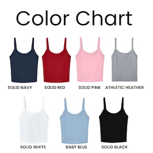 May include: A color chart displays seven solid-colored tank tops. Colors include solid navy, red, pink, athletic heather, white, baby blue, and black. The text "Color Chart" is at the top of the image.