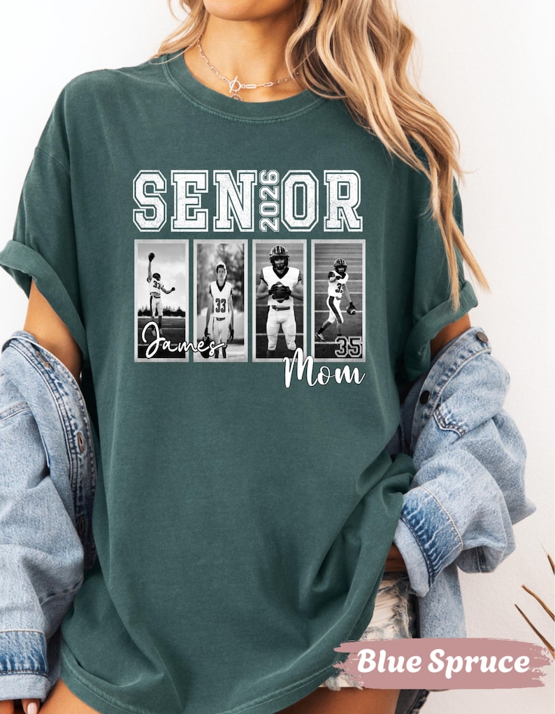 May include: A Blue Spruce t-shirt with the text "SENIOR 2026" in white block letters. Below the text are four black and white images of football players. The word "James" and "Mom" are written below the images.