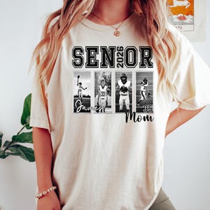 May include: Ivory-colored t-shirt with the text "SENIOR 2026" in black block letters. Below the text are four black and white photos of athletes. The word "Mom" is printed below the photos. The shirt is a relaxed fit.