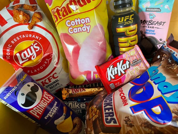 International Snack Gift Box, Prime Drink, Kit Kat, Chips, Chocolate PLEASE READ DESCRIPTION