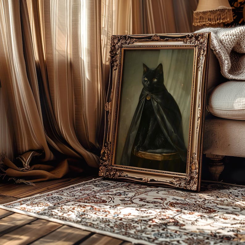 May include: A black cat wearing a cape is depicted in a framed oil painting. The painting is set against a backdrop of beige curtains and a cream-colored couch.