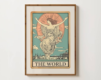 Peut inclure: Impression encadrée d'une carte de tarot, "Le Monde". L'œuvre représente une femme aux bras tendus devant un soleil rayonnant, avec un paysage urbain en dessous. La palette de couleurs comprend le beige, le turquoise et le pêche.