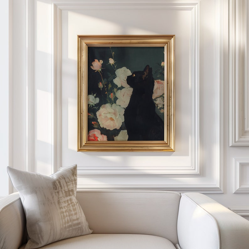 May include: A framed print of a black cat sitting in a bouquet of white and pink roses. The cat is looking to the right of the image. The background is a dark green.