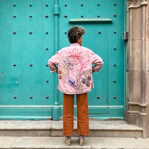 Upcycled customized pink coloured light denim jacket