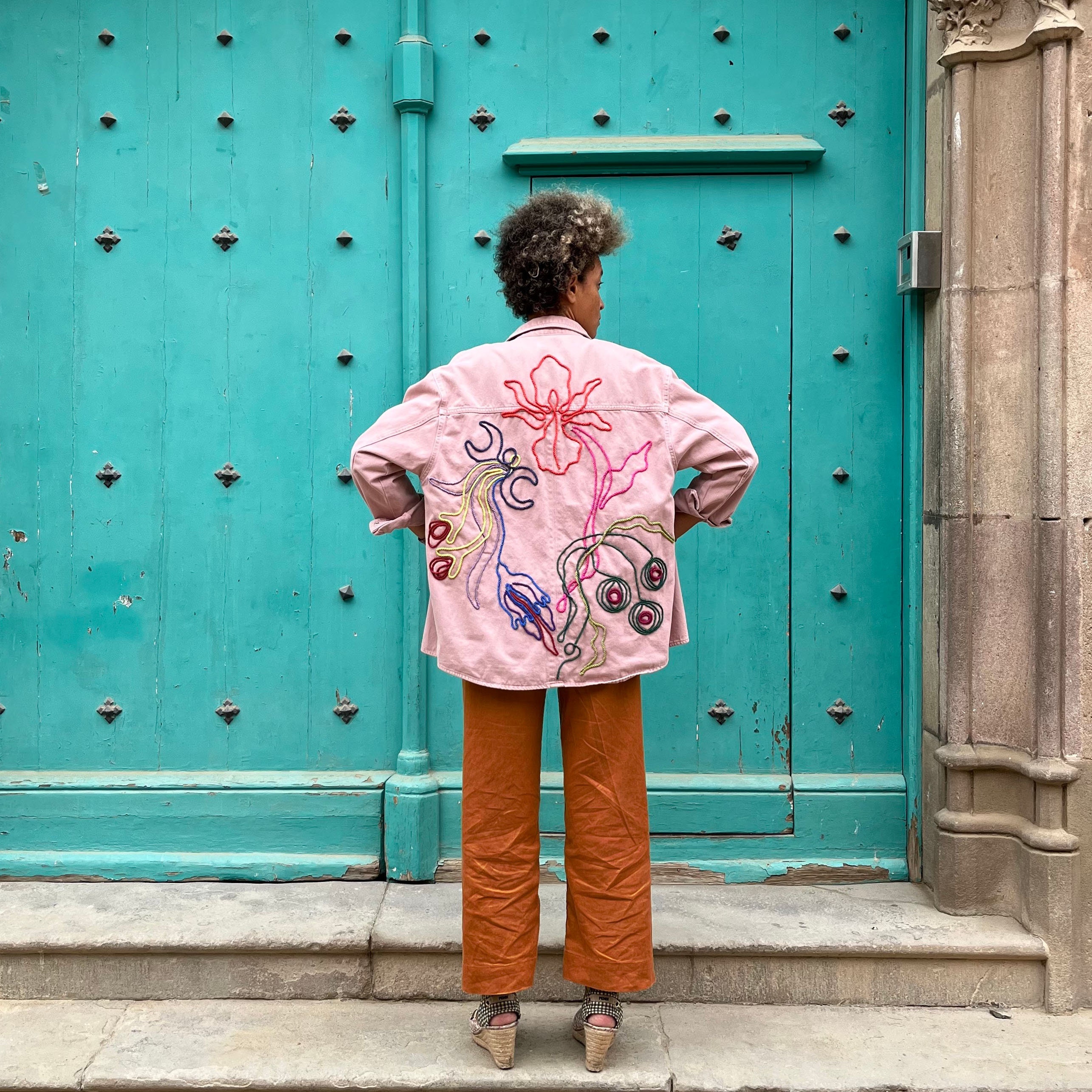 Upcycled customized pink coloured light denim jacket