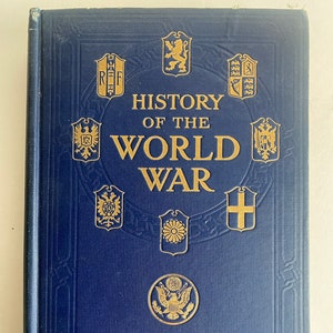 May include: A blue hardcover book titled "History of the World War" by Frank H. Simonds. The cover features gold lettering and several gold crests.