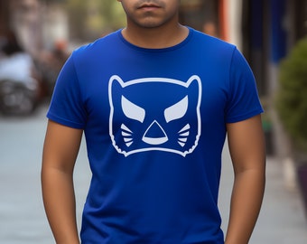 May include: A royal blue t-shirt with a white graphic of a stylized cat mask.