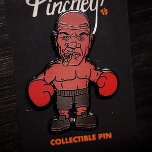 Mike Tyson Ear Bite Enamel Pin - Hard Enamel, Black Nickel, Iconic Boxing Moment, Collectible Pin, Gift for Boxing Fans, Unique Novelty Pin