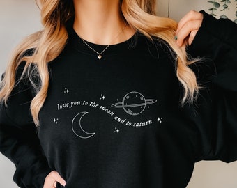 to the moon and to saturn crewneck sweatshirt