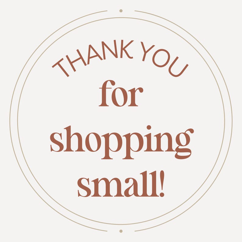 May include: A circular sticker with a light beige background and a thin circular border. The text 'THANK YOU for shopping small!' is printed in the center in a dark terracotta serif font, with the words stacked in four distinct lines.