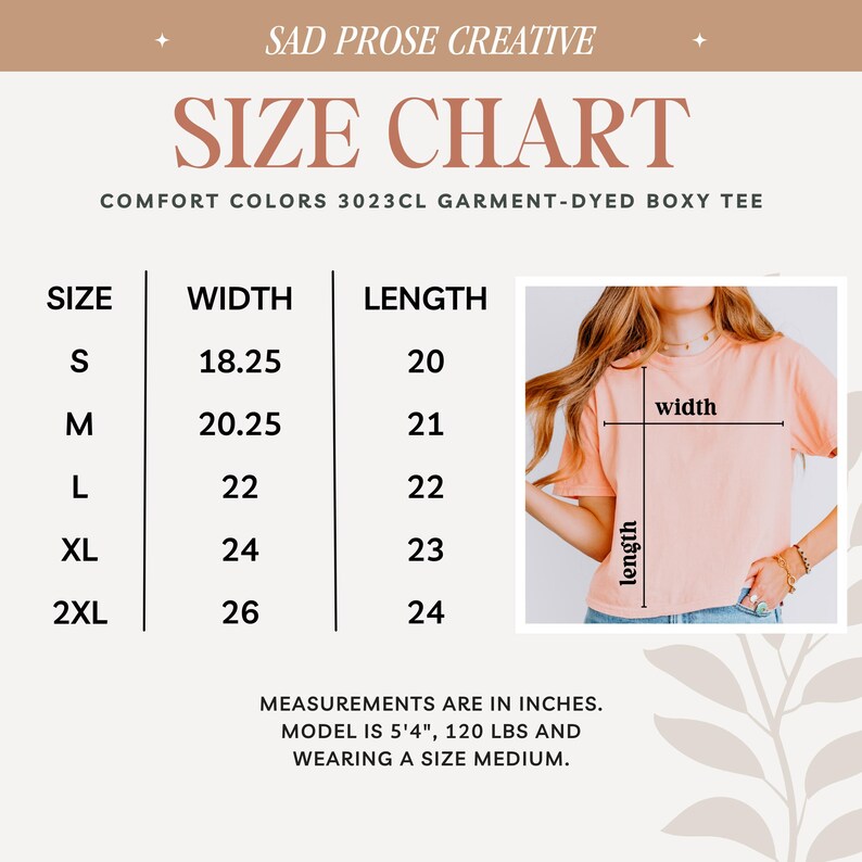 Peut inclure: Tableau des tailles pour un t-shirt boxy teint&eacute; en pi&egrave;ce, indiquant les mesures de largeur et de longueur en pouces pour les tailles S, M, L, XL et 2XL. Le tableau comprend &eacute;galement une photo d'un mannequin portant le t-shirt en taille M.