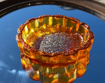 Cenicero de resina con cara sonriente