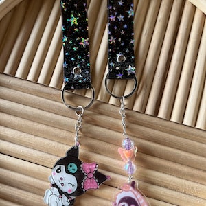 Kuku keychains with sparkly star vinyl straps