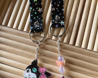 Kuku-sleutelhangers met vinylbandjes met glitterster