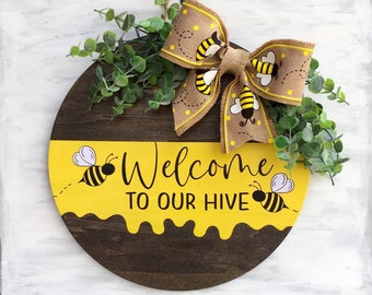 Welcome to our hive, 14" round bumblebee door hanger/wreath/sign, choose your own bow and its position on your hanger, comes ready to hang