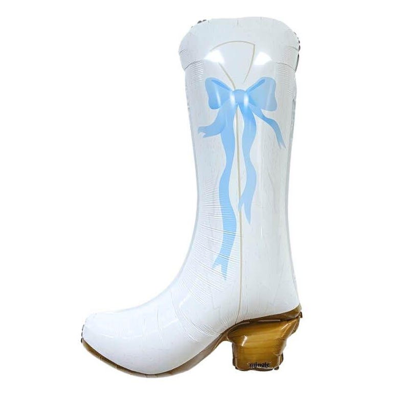 May include: White cowboy boot-shaped balloon with a light blue bow and ribbons. The balloon has a brown heel and is designed to stand upright. A festive decoration for a party or event.