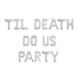 May include: A set of silver foil letter balloons spelling out the phrase TIL DEATH DO US PARTY. The balloons are arranged in three rows, with each letter individually inflated to create a metallic, reflective surface for event decoration.
