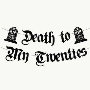 May include: Black and white banner with the text "Death to My Twenties" in a gothic font. The banner is decorated with two black tombstone-shaped cutouts with the text "RIP To My Youth" on each.