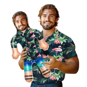 May include: A man holding an inflatable doll wearing a tropical shirt with a flamingo and floral pattern. The doll has blue and green shorts and black stripes on the legs. The man is also wearing a matching shirt.