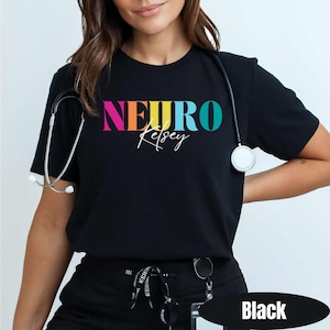 May include: Black t-shirt with the word "NEURO" in colorful block letters and the name "Kelsey" in cursive. A stethoscope hangs around the neck. The word "Black" is written in a black oval at the bottom of the image.