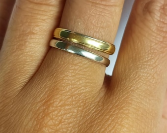 The Mixed Metal Stack: Gold & Silver Bands, only one ring in silver and one ring in brass, New year Jewelry.