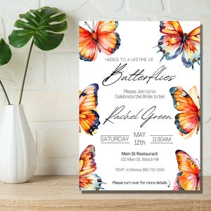 May include: A white bridal shower invitation featuring a watercolour illustration of butterflies in shades of orange, yellow, and blue. The text reads "Here's to a lifetime of Butterflies. Please join us to celebrate the bride to be! Rachel Green. Saturday, May 12th, 11:30 AM. Main St. Restaurant, 110 Main St., Watch Hill. RSVP to Monica 860-710-5555. Please turn over for more details."