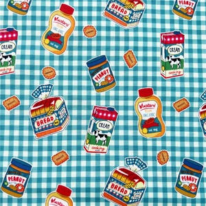 May include: A repeating pattern of food illustrations on a blue and white checkered background. The illustrations include jars of peanut butter, mustard, cartons of cream, loaves of bread, and cookies. The food illustrations are in a cartoon style.
