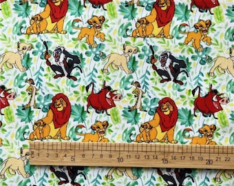 May include: White fabric with a repeating pattern of cartoon characters from the Lion King movie. The characters include Simba, Nala, Pumbaa, Timon, and Mufasa. The fabric is perfect for quilting, sewing, and crafting.