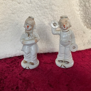 Paar Porzellan Clowns
