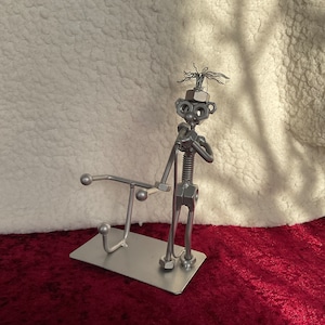 Schrauben und Muttern Sänger Skulptur
