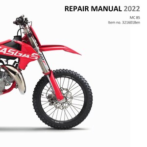 May include: A red GasGas MC 85 dirt bike with black wheels and a white background. The bike is shown from the front, with the front wheel and forks in focus. The text "REPAIR MANUAL 2022" is printed in black at the top of the image, with the text "MC 85" and "Item no. 3216018en" printed below. The GasGas logo is printed in the top right corner of the image.