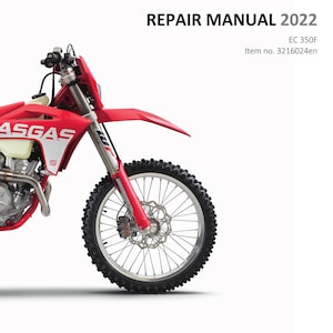 Pode incluir: Manual de reparação de motos GasGas EC 350F vermelho e branco para 2022. A imagem mostra a frente da moto com um pneu dianteiro grande e o logotipo GasGas. O manual é da Manual Central.