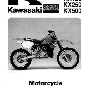 Puede incluir: Manual de servicio de motocicleta Kawasaki en blanco y negro para los modelos KX125, KX250 y KX500. La portada del manual presenta una foto de una moto de cross Kawasaki y el texto "Motorcycle Service Manual" y "eBay: Manual. Central".