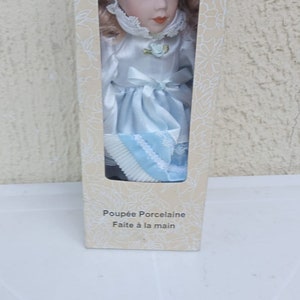 Doll in porcelain- Made in  Paris-french styled doll