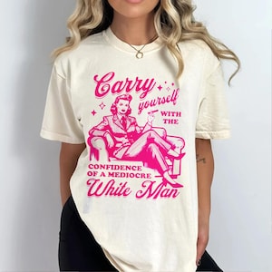 平凡な白人男性の自信をもって振る舞うシャツ、フェミニストシャツ、活動主義抗議Tシャツユニセックス