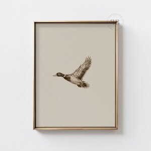 Watercolor flying duck wall art in vintage wildlife style with neutral tones, farmhouse nursery printable bird digital download.