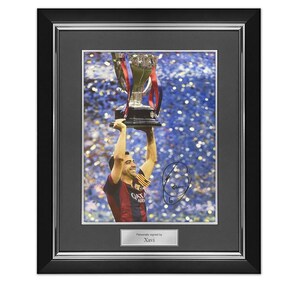 Xavi Signed Barcelona Football Photo: Trophy Lift. Deluxe Frame