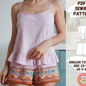 May include: A PDF sewing pattern for a pink and white two-piece outfit. The pattern includes a sleeveless top with a ruffle and a pair of shorts. The pattern is available in sizes XS-5XL (US 2-30) and includes an English tutorial.  PDF Sewing Pattern.