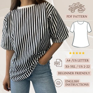 May include: A PDF sewing pattern for a striped, oversized t-shirt. The pattern includes instructions in English and is available in sizes XS-5XL. The pattern is printed on A4 or US Letter paper and is beginner friendly.