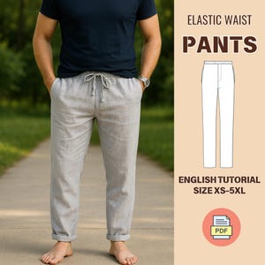 Puede incluir: Pantalones grises claros con cintura elástica y cordón, usados por una persona. Los pantalones están doblados en los tobillos. El texto a la derecha dice "ELASTIC WAIST PANTS" y "ENGLISH TUTORIAL SIZE XS-5XL".