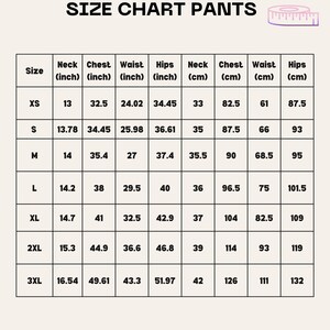 May include: A size chart for pants, with measurements in inches and centimeters. The chart includes sizes XS to 3XL, listing neck, chest, waist, and hip measurements. The text "SIZE CHART PANTS" is at the top.