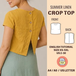 May include: Mustard yellow linen crop top with three buttons down the back. The top has short sleeves and a split back design. The image includes text that says "Summer Linen Crop Top" and "English Tutorial Size XS-5XL US 2-30".