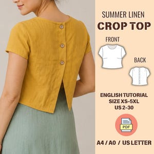 May include: A mustard yellow linen crop top with short sleeves and a back button closure. The image includes text: SUMMER LINEN CROP TOP, FRONT, BACK, ENGLISH TUTORIAL, SIZE XS-5XL, US 2-30, PDF, A4 / A0 / US LETTER, and two white line drawings.