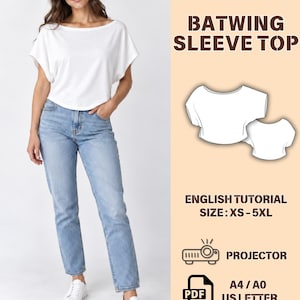 以下が含まれることがあります： ボートネックのバットウィングスリーブトップスの型紙。画像には「SEWING PATTERN」「BATWING SLEEVE TOP」「ENGLISH TUTORIAL」「SIZE: XS-5XL」「PROJECTOR」「PDF」「A4 / A0 US LETTER」というテキストと、Mの文字が入ったロゴが含まれています。