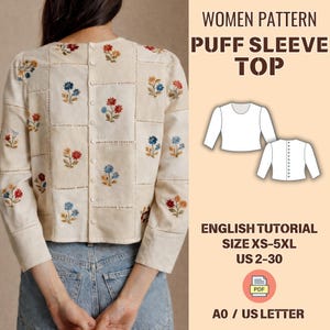 Puede incluir: Top de manga abullonada color crema con detalles florales bordados en rojo, azul y naranja. El top presenta un diseño de patrón cuadrado y una espalda abotonada. La imagen incluye el texto "WOMEN PATTERN PUFF SLEEVE TOP" y "ENGLISH TUTORIAL SIZE XS-5XL US 2-30".