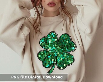 May include: A white sweatshirt with a green four-leaf clover design made of sequins. The clover is outlined in black.  PNG file Digital Download.